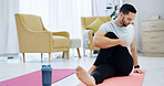 Man, fitness and stretching with yoga mat in home for indoor exercise, training or workout. Active, male person or pilates with body warm up or preparation for physical activity, health or wellness