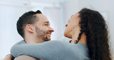 Buy stock photo Happy, couple and hug with love in home for comfort, indoor romance or weekend break together. Man, woman or embrace with smile, humor or connection for holiday, vacation or free time in house