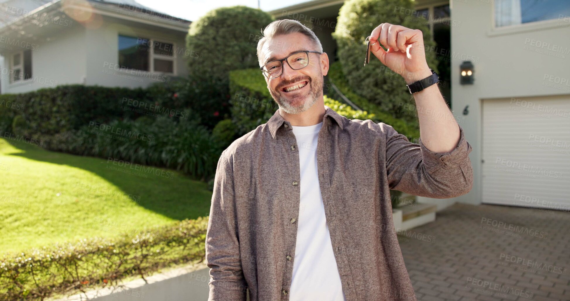 Buy stock photo Real estate, man and key to new house, ownership or property purchase with mortgage investment. Relocation, happy mature person and keychain for dream home, landlord or portrait outdoor at front yard