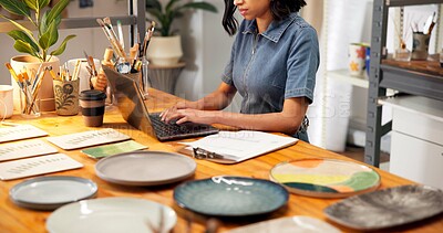 Buy stock photo Pottery, woman and hands in small business with laptop, stock checklist and update online catalog. Creative entrepreneur, tech and sheet in studio for clay order, item pricing and inventory control