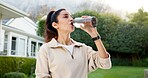 Break, water or woman in backyard with fitness, training pause or recovery in wellness activity. Hydration, cool down or mature person with bottle, workout rest or refreshing stop in outdoor exercise