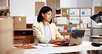 Woman, typing and laptop at startup for logistics, schedule and stock availability for delivery. Smile, female person and review in office with tech, confirm dispatch and update pricing for ecommerce