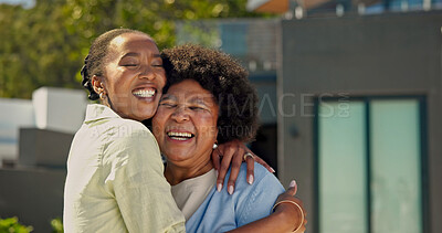 Buy stock photo Hug, happy and woman with senior mom in backyard for bonding, connection and relationship. Family, outdoor and African person with embrace, smile and elderly mother for affection, trust and love
