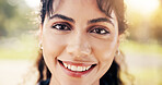 Outdoor, portrait and woman with smile, break and confident with positive attitude or calm in nature. Park, fresh air and happy person with pride on weekend, wellness and laughing with stress relief