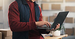 Hands, man and laptop in small business for shipping, route search or waybill review in logistics. Startup, person or typing on tech for fleet tracking, delivery status update or inventory management