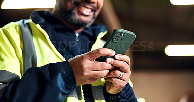 Buy stock photo Happy, construction and hands of man with phone for message, connection and chat with supplier. Mature, supervisor and African person on cellphone, internet and networking for remodeling in warehouse