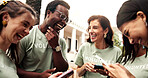 Smile, people and phone outdoor for volunteering, reviews and positive feedback on charity event. Happy, team and laugh with mobile app for approval, good rating and recognition for community service