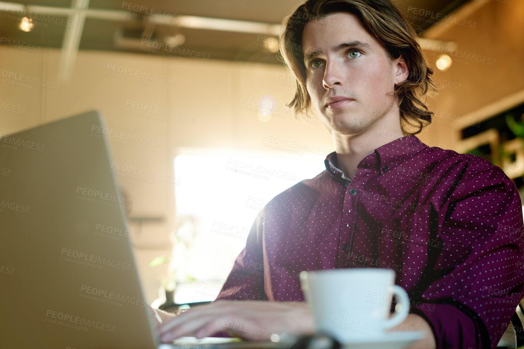 Buy stock photo Cafe, remote work and man with laptop, thinking and creative for digital magazine, employee and app. Reflection, reporter and person with tech for article, online or freelance project in coffee shop