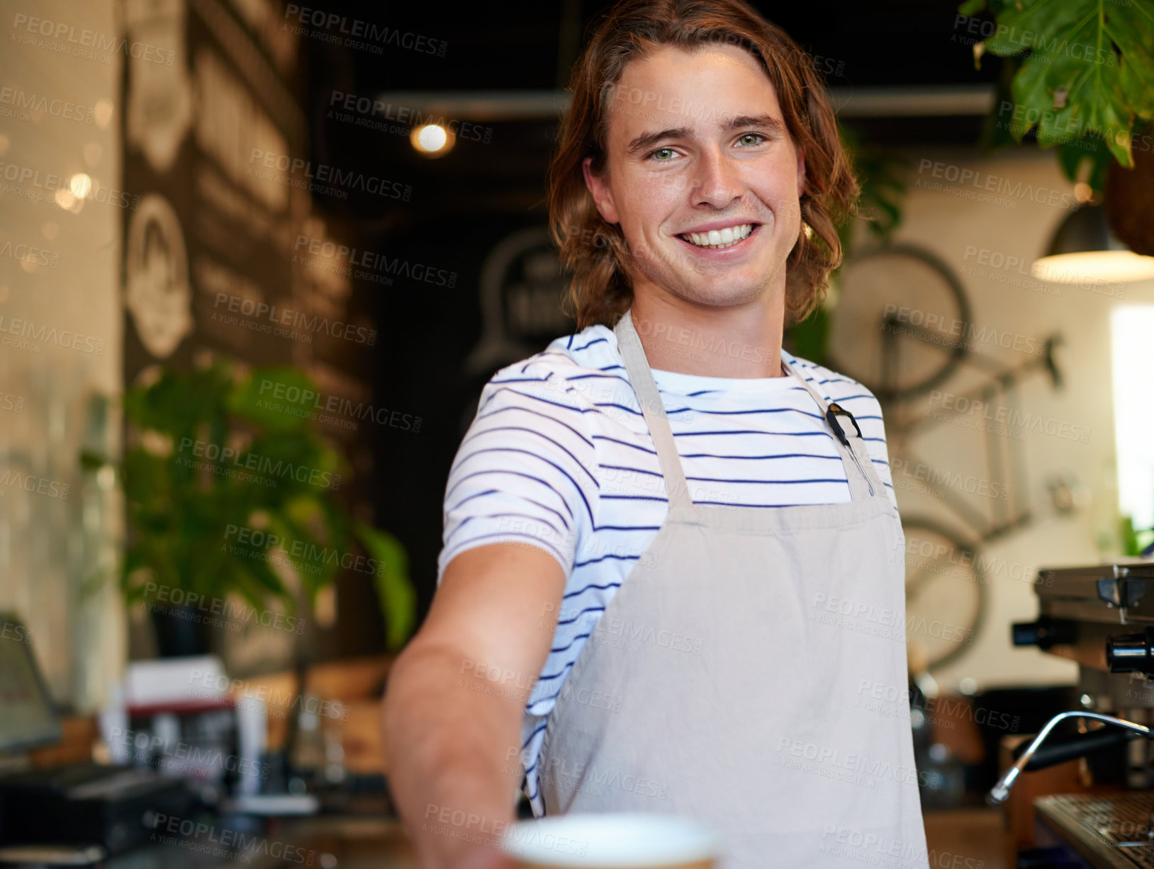 Buy stock photo Giving, counter and portrait of man in coffee shop for serving drinks at cafe, startup and business. Restaurant, hospitality and happy barista, server and person with takeaway for customer service
