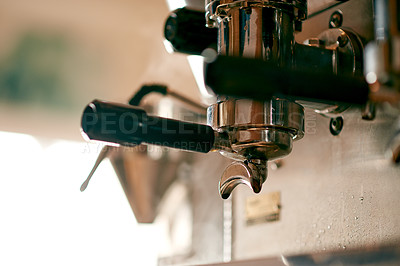 Buy stock photo Coffee machine, portafilter and appliance in cafe for hospitality, service industry and brewing process. Closed, clean and equipment in diner for espresso extraction, caffeine and small business menu