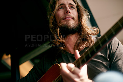Buy stock photo Man, guitar and thinking with music, creativity and low angle for songwriting process at apartment. Person, musician and artist with string instrument, composer and inspiration for melody at house