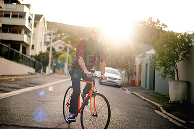 Buy stock photo Travel, adventure and portrait of man on bicycle in city for commuting, journey or carbon footprint. Street, cycling and person on bike for eco friendly transport on vacation, weekend trip or holiday