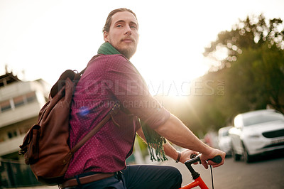 Buy stock photo Cycling, thinking or man on bicycle in city for eco friendly transport, commute or entrepreneur. Outdoor travel, leaving or designer on road in urban town with ride, fashion or bike for creative job