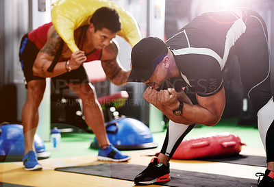 Buy stock photo Coach, bend and people with sand bag exercise for training  class, legs workout or core strength. Athletes, personal trainer and men with weight equipment for fitness tips, body health or gym support