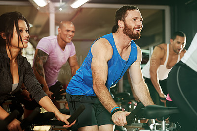 Buy stock photo Happy, spin class or man on cycling equipment in training exercise for wellness, health or fitness. Athlete, challenge or active people on bicycle machine for workout, body or cardio in gym community