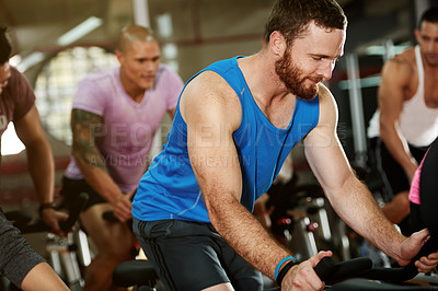 Buy stock photo Intensity, spin class or man on cycling bike in training or exercise for wellness, health or fitness. Athlete, club or active people on bicycle machine for workout, body or challenge in gym community
