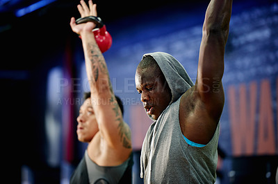 Buy stock photo Fitness, kettlebell and men in gym for workout, wellness or body building with teamwork for strength. Health, weights and male athletes with arm exercise for training together in sports center.