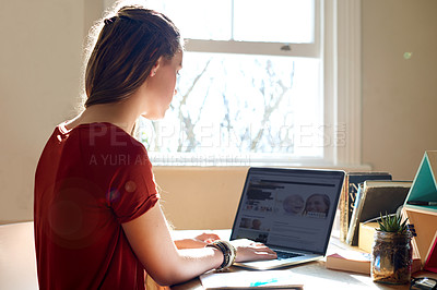 Buy stock photo Studying, student and girl with laptop, home and typing on website for research, screen and online. House, digital and teenager with tech for education, project or preparing for exam with information