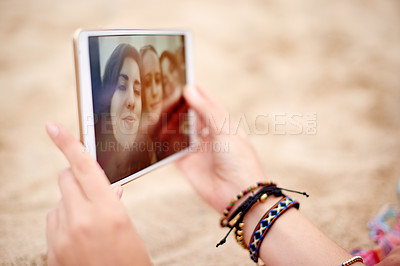 Buy stock photo Hands, friends and selfie with tablet screen outdoor, relax on beach for girl bonding and social media photo for memory. Photography, people and picture with vacation or weekend together with tech