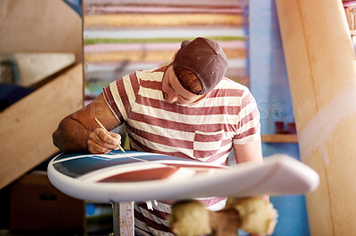 Buy stock photo Craft, drawing or man in surfboard workshop for hobby, maintenance or manufacturing. Artistic production, paint or creative wooden design in small business for surfing equipment or renovation process