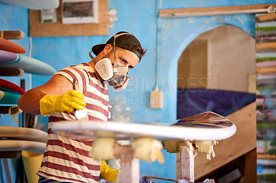 Buy stock photo Painter, man and surfboard in workshop for restoration, project tools or manufacturing. Production, painting or creative wooden craft in small business for surfing equipment or renovation process