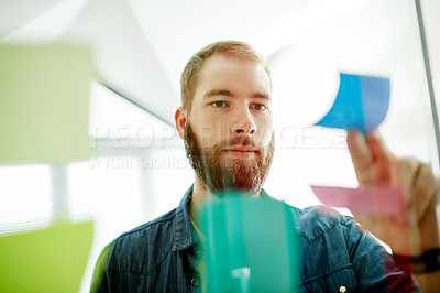 Buy stock photo Office, sticky notes and business man by glass for brainstorming, planning and project agenda. Creative agency, thinking and person with tasks, reminder and paper for schedule, strategy and proposal