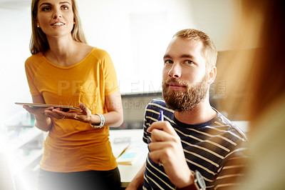 Buy stock photo Man, woman and listen at meeting, startup and tech with teamwork, brainstorming and planning at office. People, group and discussion with agenda, review or feedback for project at creative agency