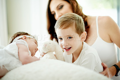 Buy stock photo Baby girl, boy and mother in bedroom of home together for bonding, family time or relationship. Love, maternity or portrait with woman, son and daughter on bed in apartment for morning wellnes