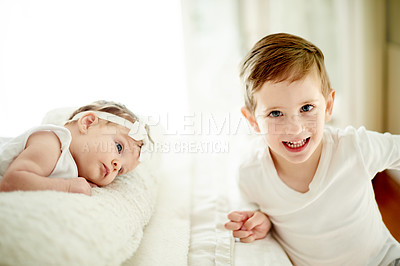 Buy stock photo Baby, bonding and portrait of happy boy in bedroom of home with sibling for development or growth. Family, love or smile with brother and infant sister on bed in apartment together for security