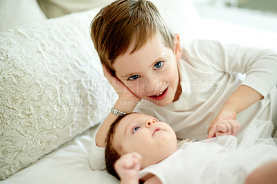 Buy stock photo Baby, bonding and portrait of boy in bedroom of home with sibling for development or growth. Family, love or relax with brother and infant sister on bed in apartment together for safety or security