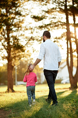 Buy stock photo Back, father and girl in forest, walking and bonding together with vacation, nature and travel. Adventure, outdoor and parent with daughter, holiday and dad with kid, child development and relax