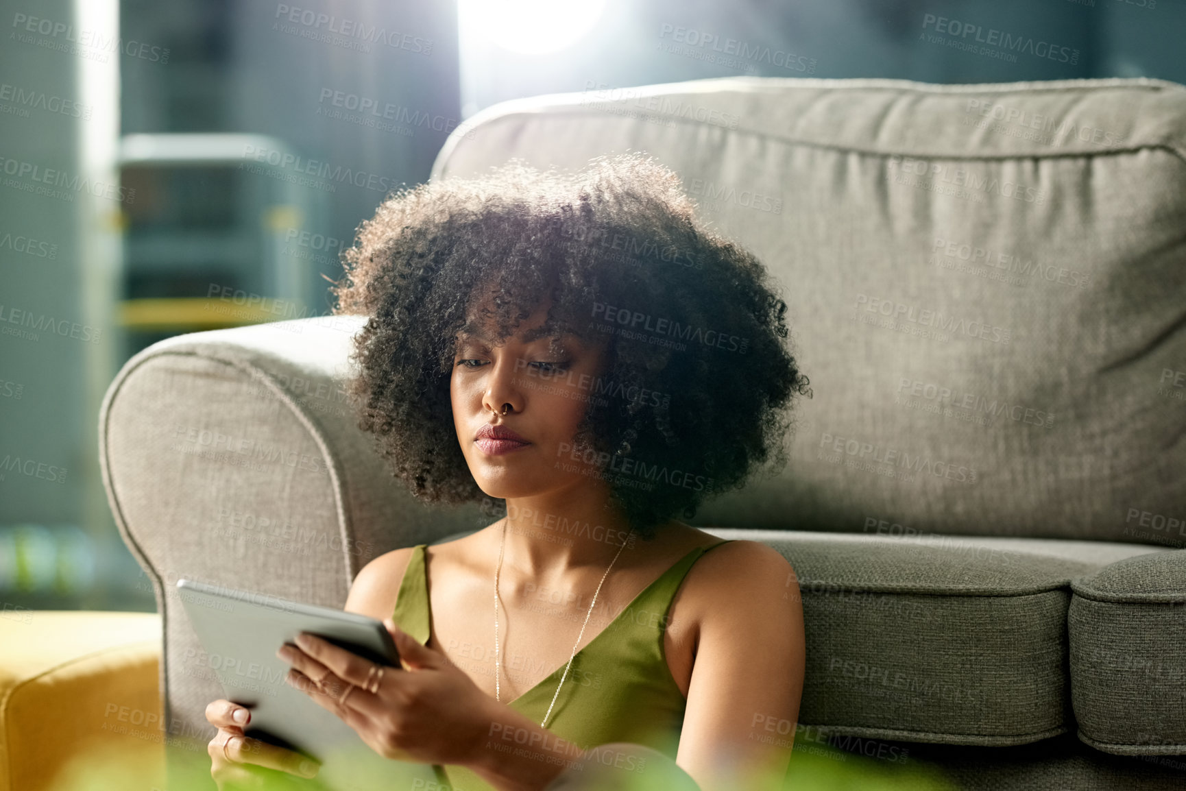 Buy stock photo Relax, tablet and search with woman in house for social media, streaming service and connection. Movie showtimes, subscription and film schedule with person in living room of home for reading and app