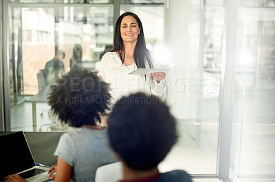 Buy stock photo Speaker, tablet and teamwork with business woman in office for meeting, project proposal and planning. Presentation, research and collaboration with group of people in agency for report update