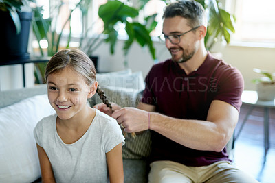 Buy stock photo Hair braid, happy man and girl in living room with bonding, helping and support for morning routine. Home, daughter and single parent on couch with grooming, together and getting ready for school.