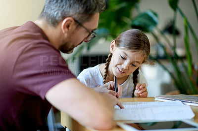 Buy stock photo Help, education and father with child for homework in house for learning, studying or project. Smile, teaching and dad with girl kid student for working on academic assignment together in apartment.