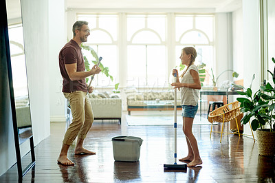 Buy stock photo Cleaning, dad and child in home with sing, dance and mop for weekend chores. Energy, family and music in apartment with responsibility, hygiene and housework in learning and support for floor washing