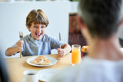 Buy stock photo Home, breakfast and father with boy, excited and bonding together with nutrition, smile and juice. Family, apartment and dad with happy son, morning food and parent with kid, healthy meal or utensils