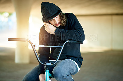 Buy stock photo Urban, thinking and man on bicycle for cycling, fashion and travel in city to chill or relax. Cool male person, underground or stunt biker in town for streetwear style, outdoor practice or wellness