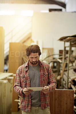 Buy stock photo Carpenter, woodwork and man with tablet in workshop for stock management, online order or research. Carpentry, worker and digital app in factory for furniture production, supplier email and planning
