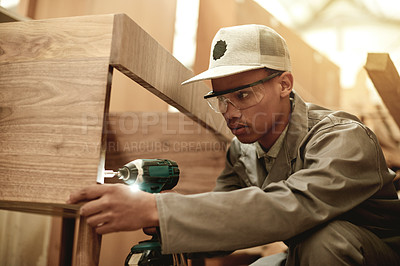 Buy stock photo Drill, PPE and carpenter in factory with woodwork, furniture restoration and building project. Tools, craftsman or male employee in workshop for cabinet making, manufacturing or industrial production