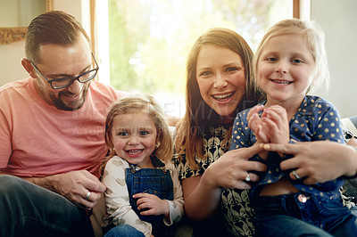 Buy stock photo Hug, portrait and trust with family on sofa in living room of home together for bonding or love. Happy, relax or smile of mother, father and daughter children in apartment for development or security