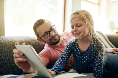 Buy stock photo Entertainment, father or child on couch with tablet, streaming cartoon or family bonding on weekend. Mature man, girl or watching movie in home with tech for subscription app, love or care in support