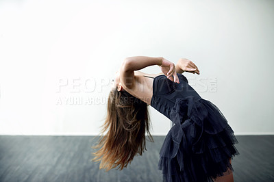 Buy stock photo Space, dancing or woman in studio for ballet motion, creative ballerina or training. Wall, white background or flexible dancer in routine with elegance, balance or talent for exercise, body or energy