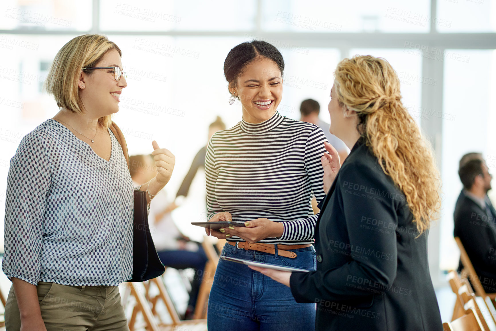 Buy stock photo Business women, meeting and conference for funny joke, planning and insurance review on tablet. Team, seminar and conversation with technology at workshop for policy, feedback and laugh in office