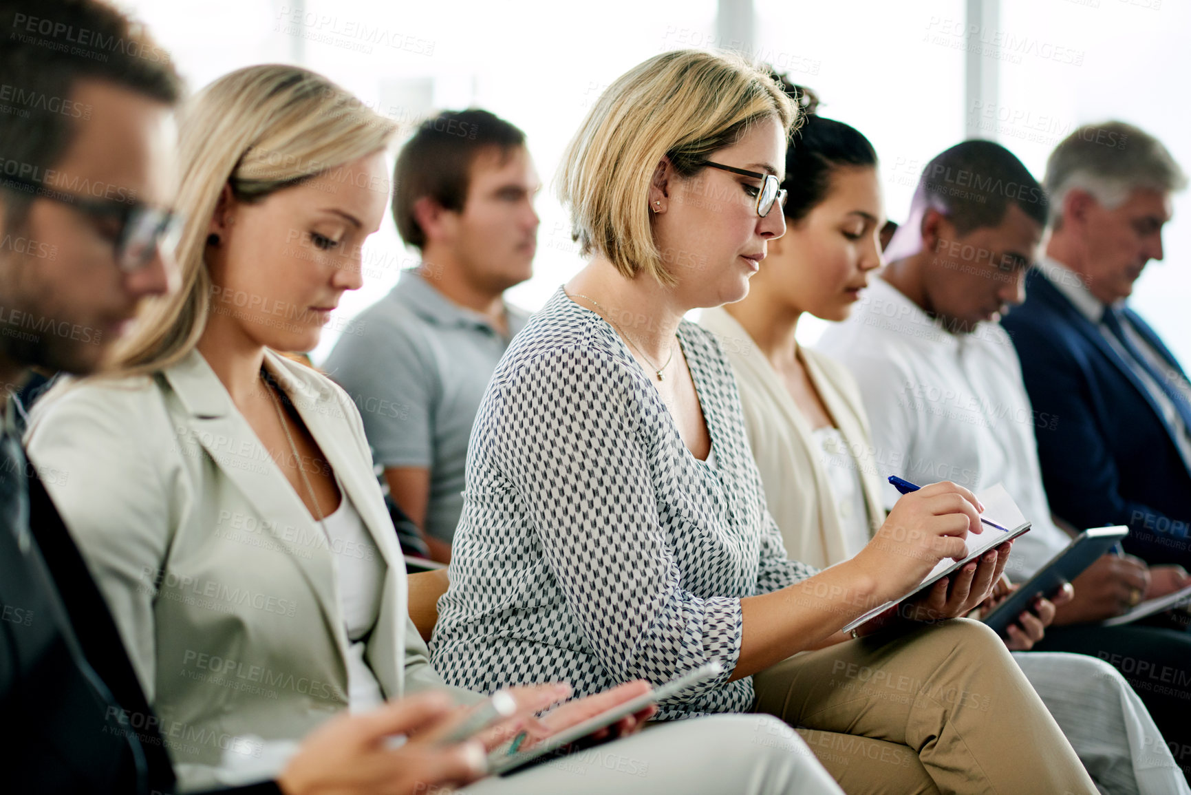 Buy stock photo Business, woman and writing notes in seminar for training, career development and schedule update. Person, employees and information for corporate convention, learning session and forum for tradeshow