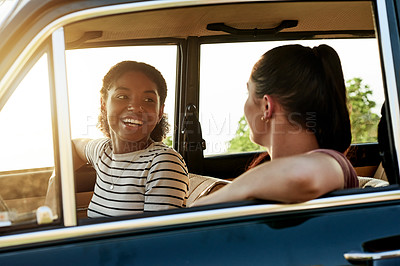 Buy stock photo Happy, friends and women in car, road trip or bonding on adventure, laugh or journey with transport. Flare, driver and people in vehicle for summer holiday, tourism and getaway on weekend and travel