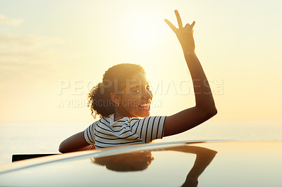 Buy stock photo Happy woman, portrait and peace sign with car for sunset view, travel or outdoor holiday in nature. Female person, driver or smile with hand gesture for road trip adventure, stop or weekend getaway