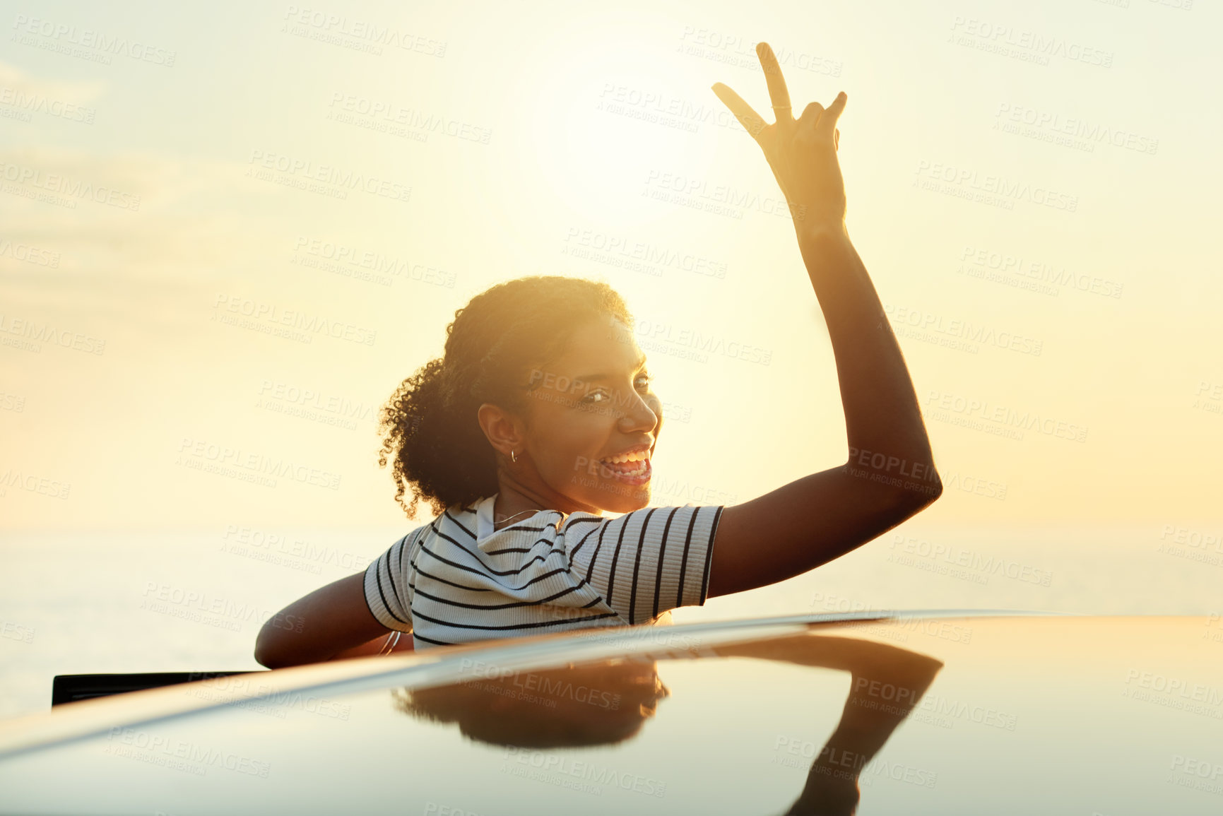 Buy stock photo Happy woman, portrait and peace sign with car for sunset view, travel or outdoor holiday in nature. Female person, driver or smile with hand gesture for road trip adventure, stop or weekend getaway
