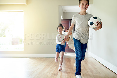 Buy stock photo Happy, kids and running for moving to new home with playful energy, joyful movement and explore property. Smile, children and parents with toys for relocation, discovery game and apartment investment