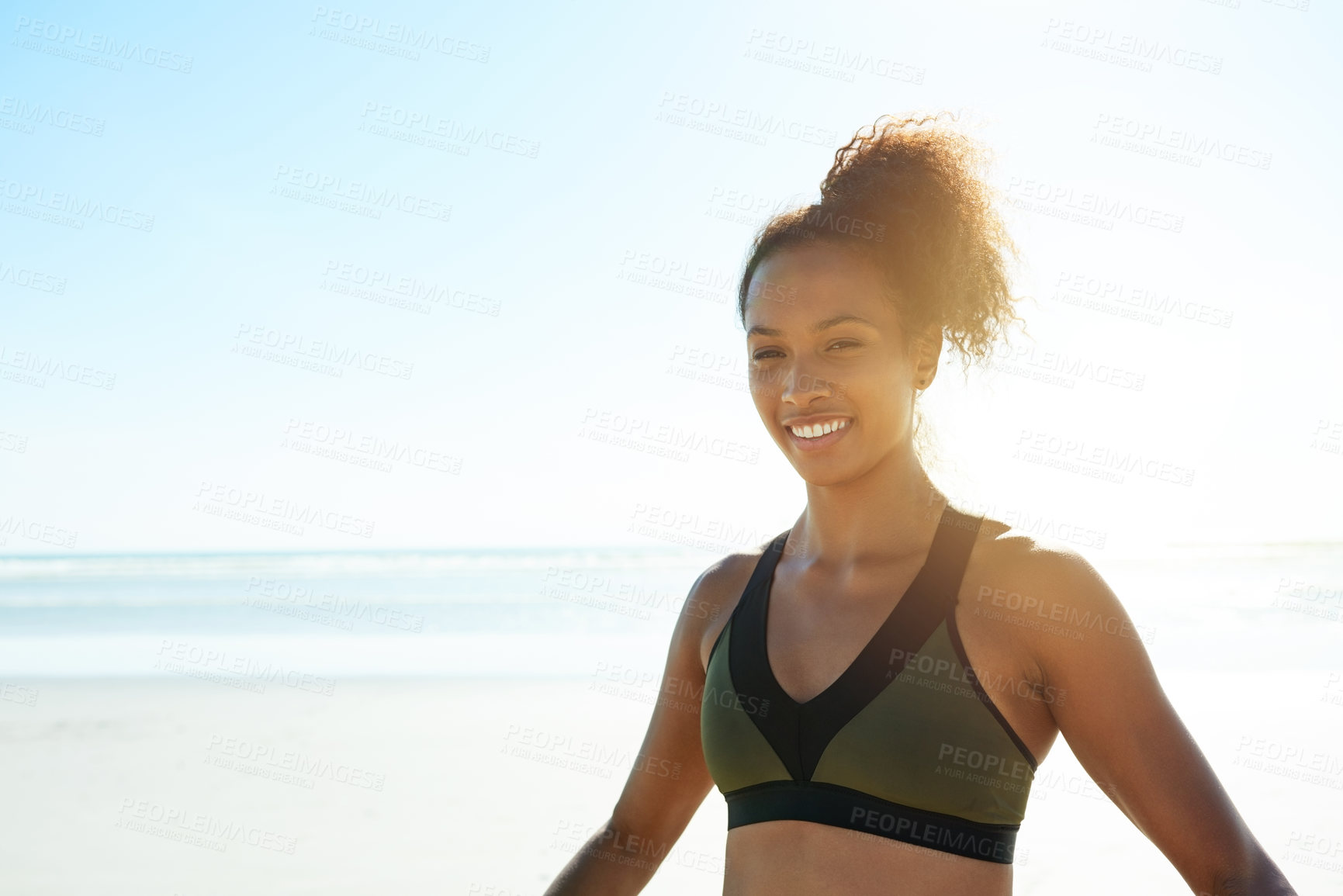 Buy stock photo Portrait, athlete and woman with smile at beach for fitness, exercise and training routine. Happy, person and space with flare for sports workout, cardio challenge and marathon practice in nature